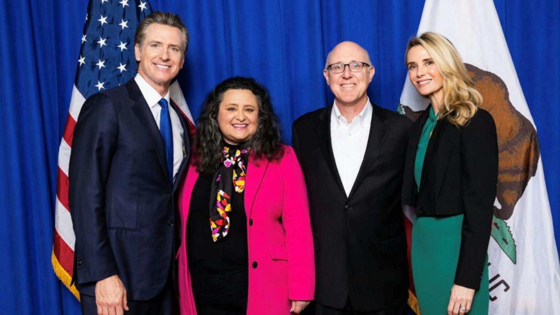 Myrna Castrejón, President and Chief Executive Officer California Charter Schools Association, stands with CCSA Chief Civic Affairs Officer Gregory McGinity, California Governor Gavin Newsom and First Partner Jennifer Newsom.