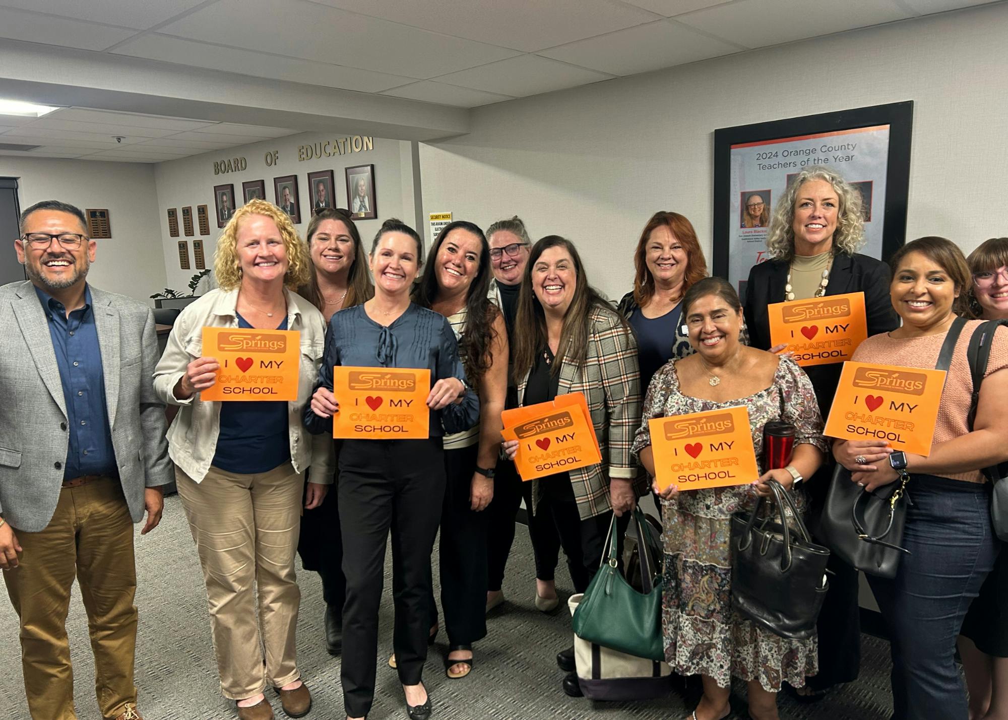 Springs Charter Schools Success Renewal Group Photo with CCSA Local Advocate. 