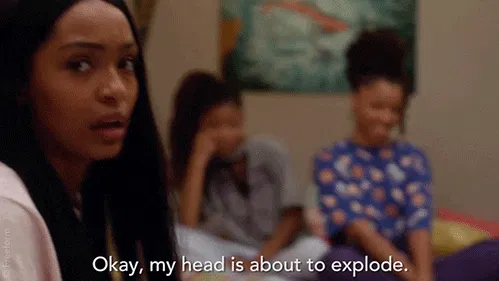 Girl mouthing the words, okay, my head is about to explode