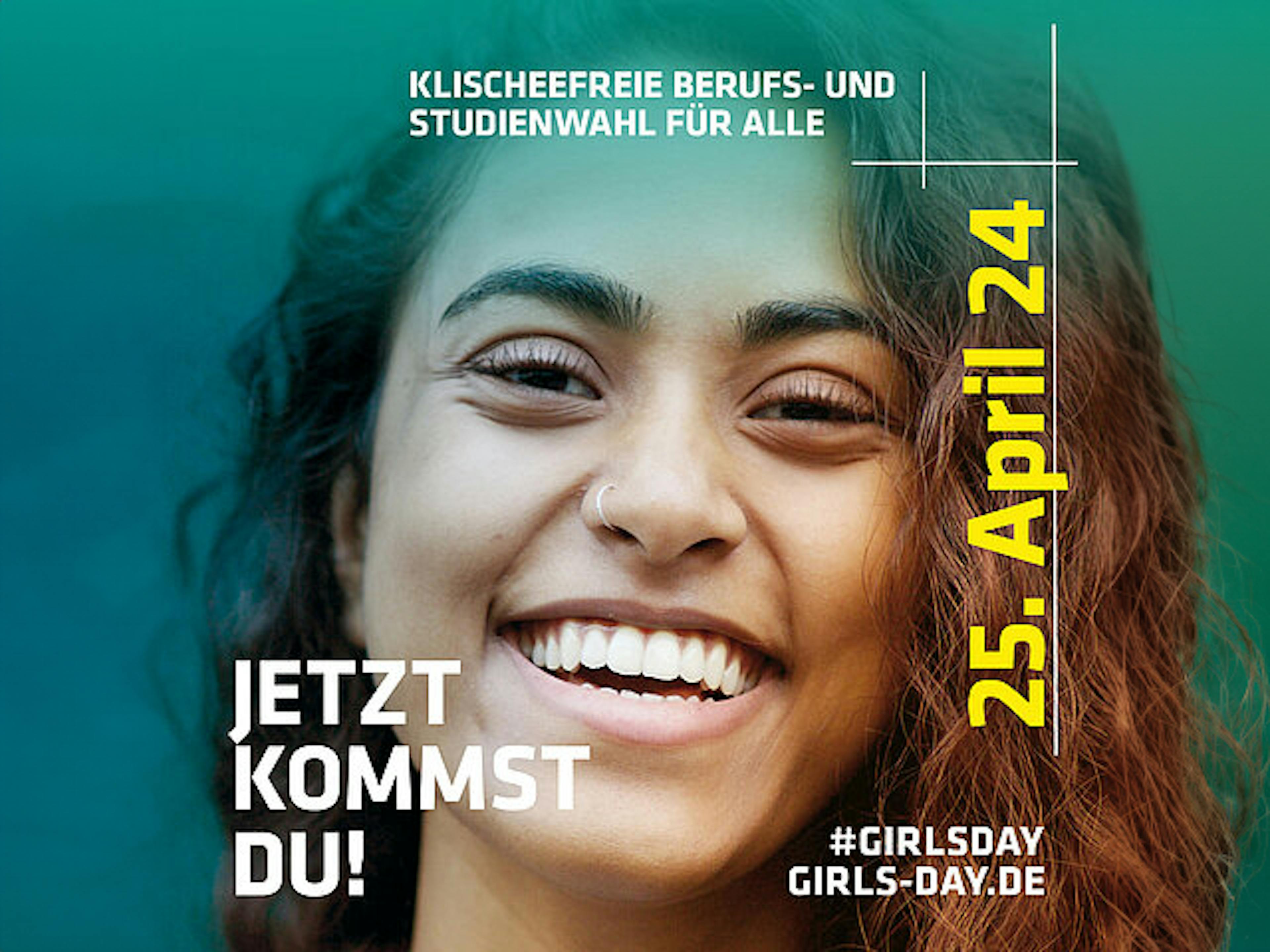 Plakat des Girl`s Day 2024. Neben der Bildaufschrift "Jetzt kommst du!" ist das Gesicht einer jungen Frau zu sehen. 