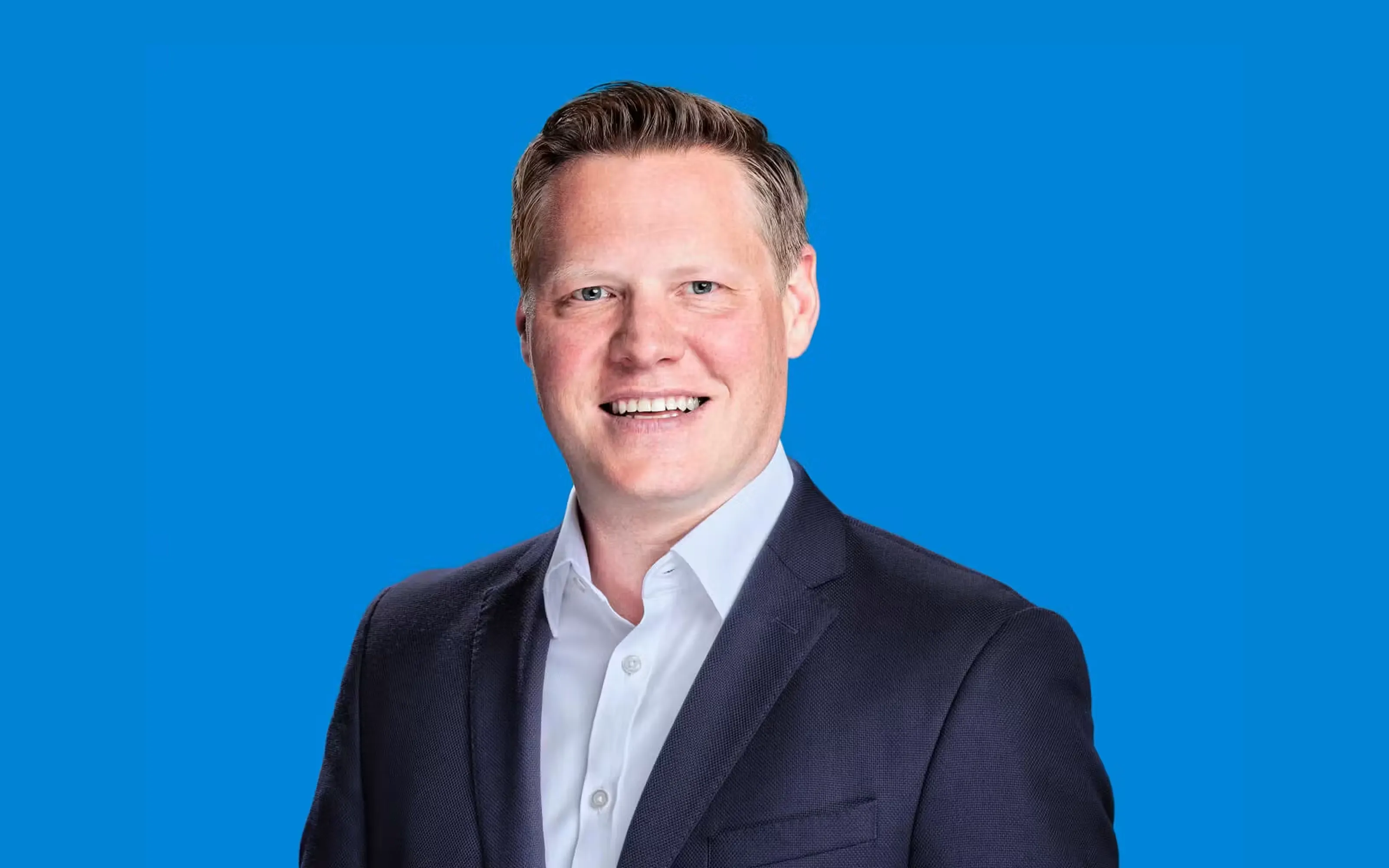 Portrait-Foto von Nicholas Loughlan, der CTO der cellcentric GmbH & Co. KG.