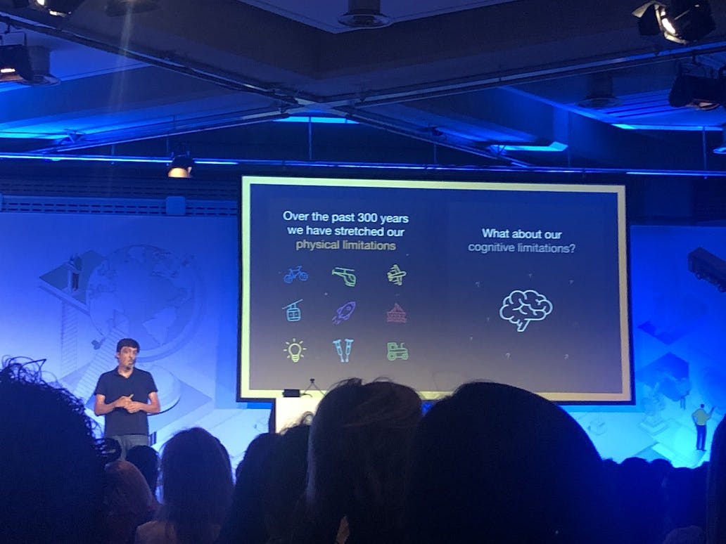 Prof. Dan Ariely presenting on stage