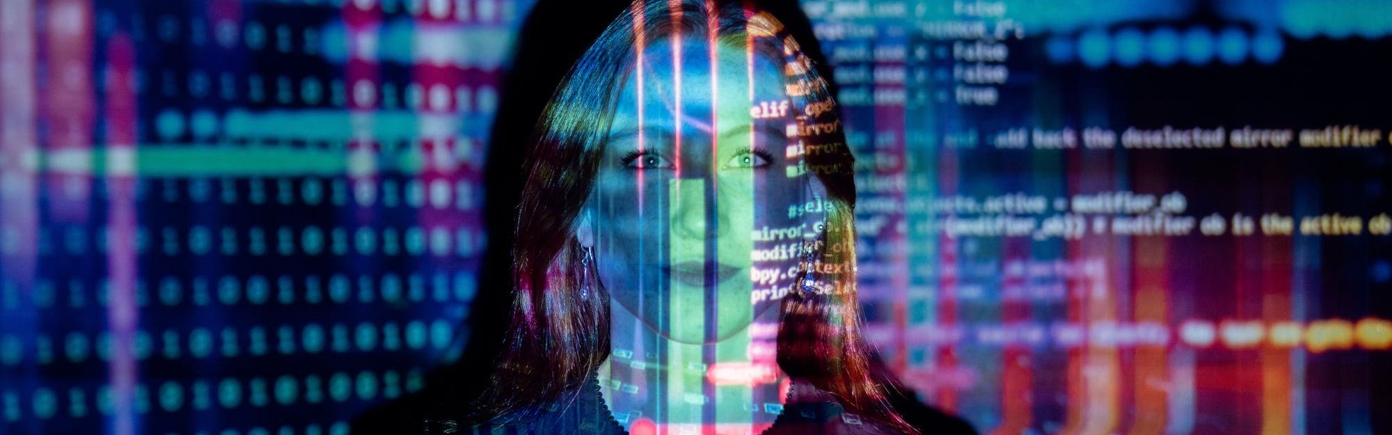 Code projected over woman