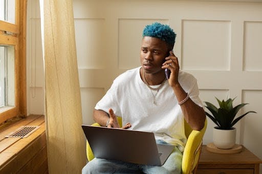 Man talking on the phone to insurance providers about therapists in San Jose