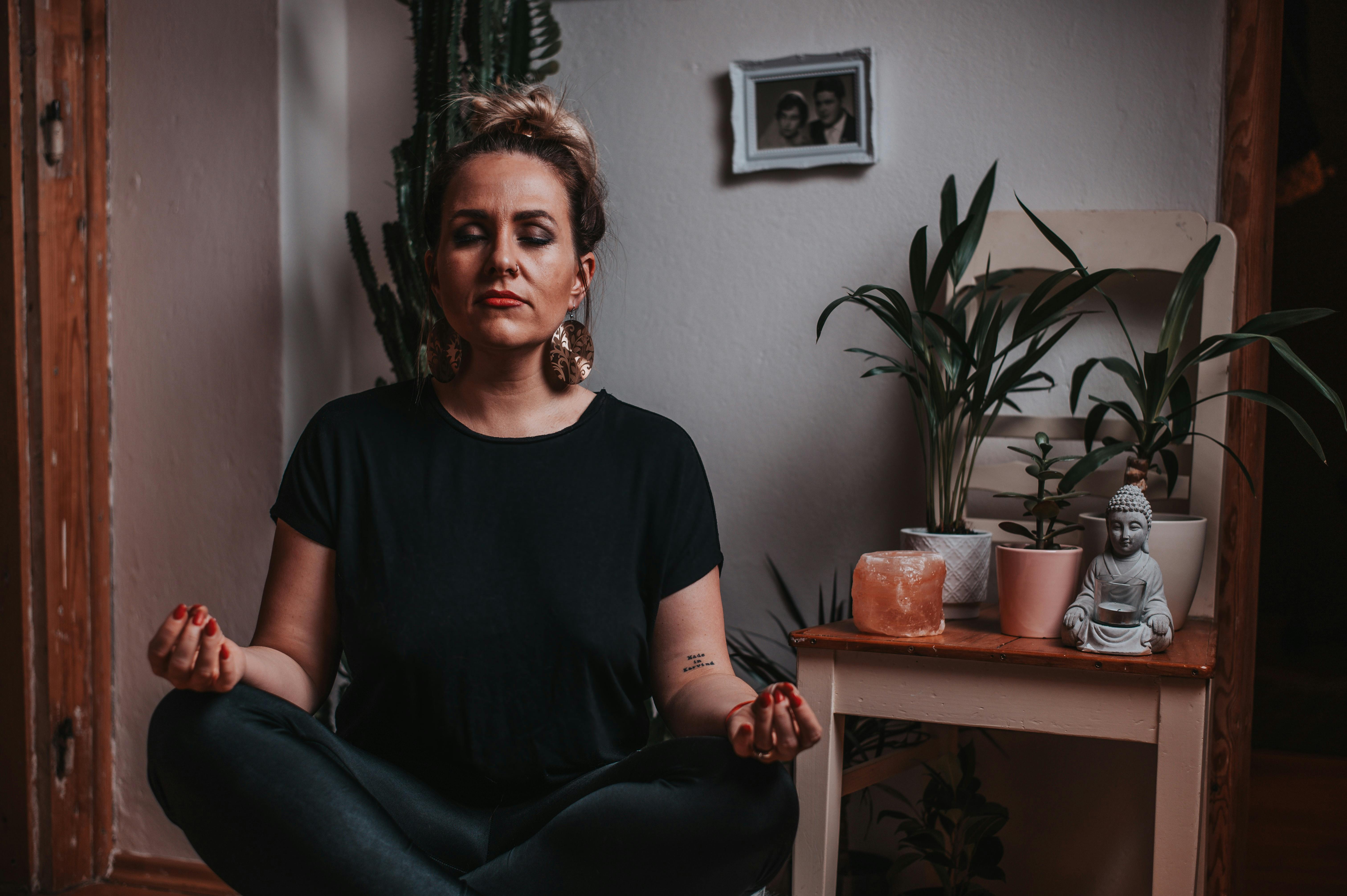 woman meditating at home