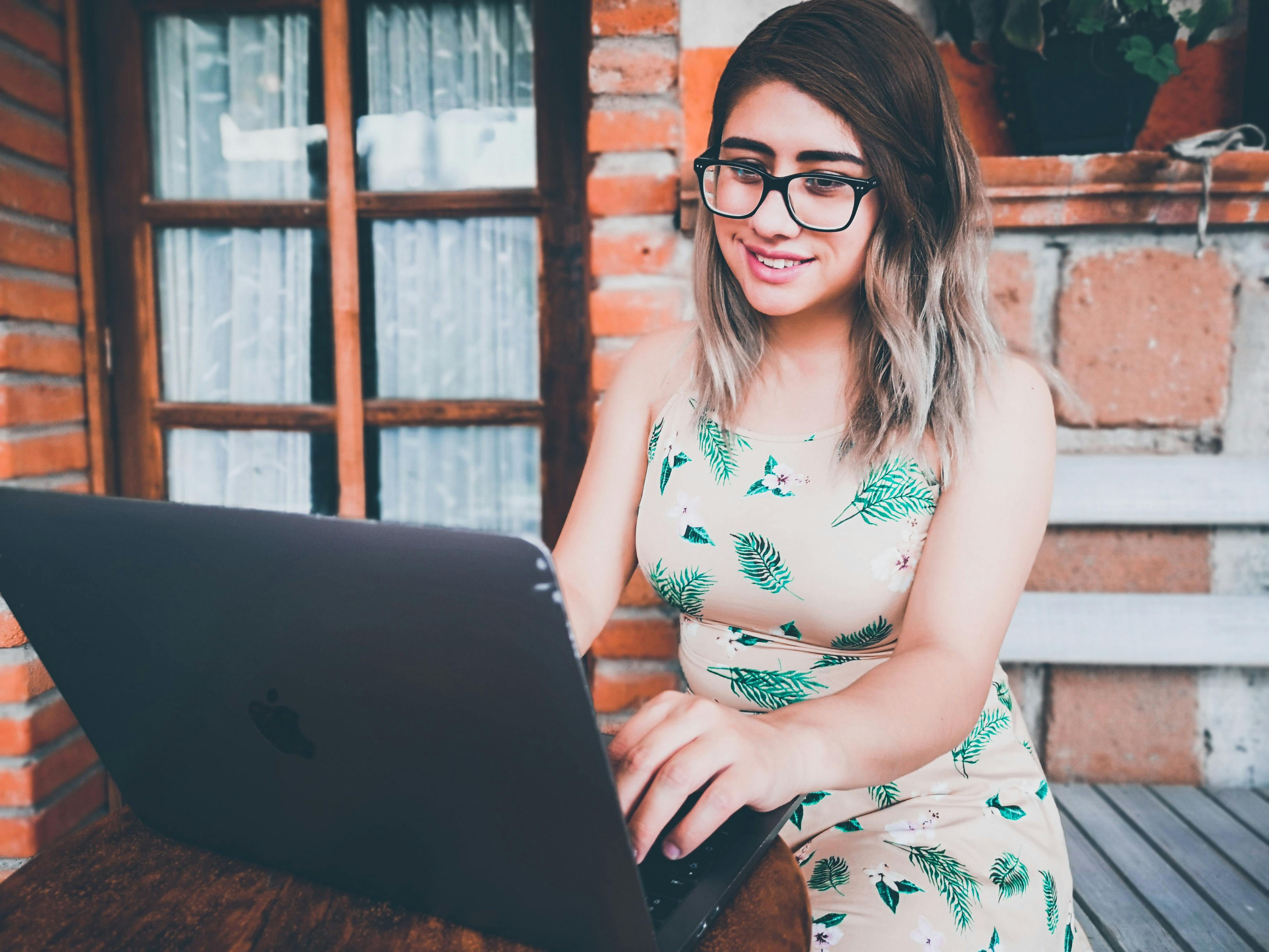 young woman receiving online mental health treatment in San Antonio