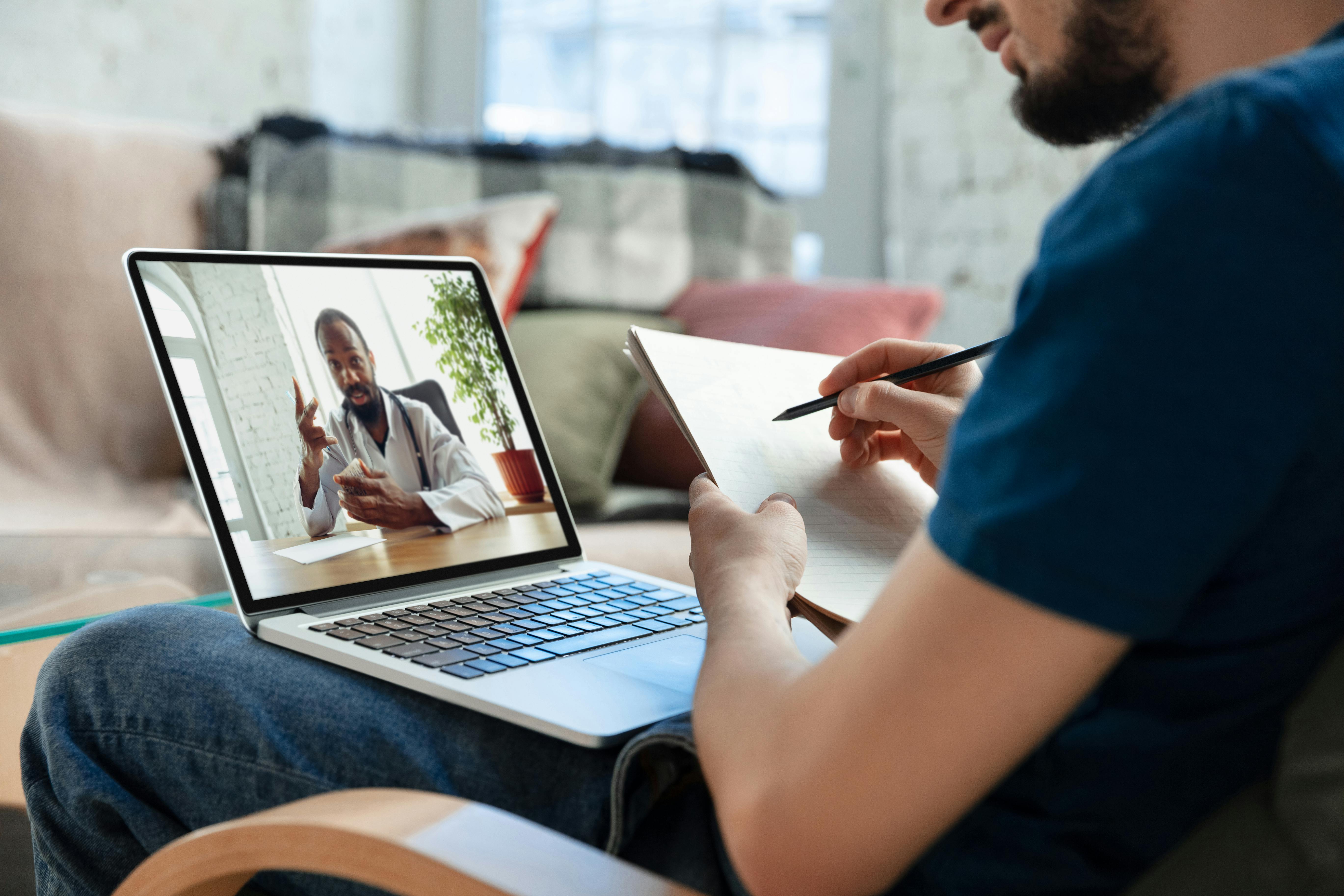 White male patient video chats with Black male licensed prescriber