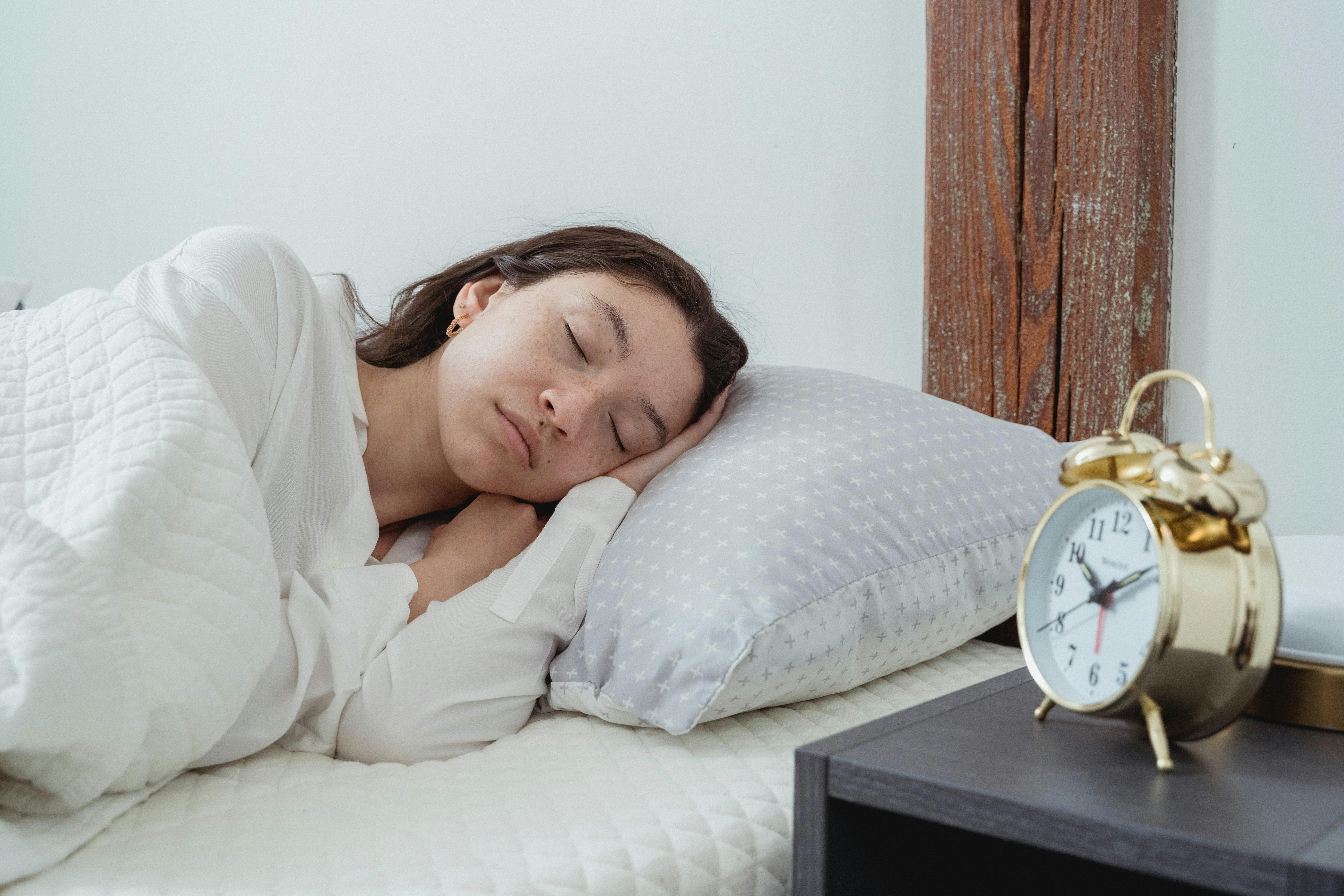 Calm woman sleeping on pillow