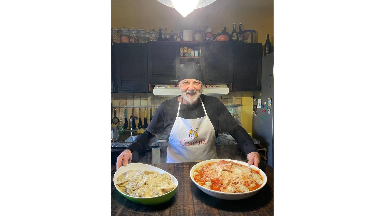 Cesarino Andrea showing two plates of Culurgiones