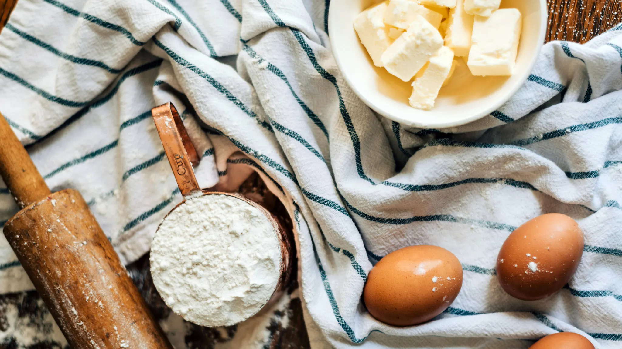 Rolling pin, flour, eggs, butter, World Baking Day