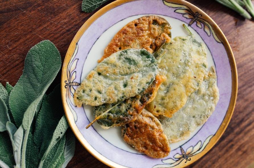 Fried sage on a plate seen from above
