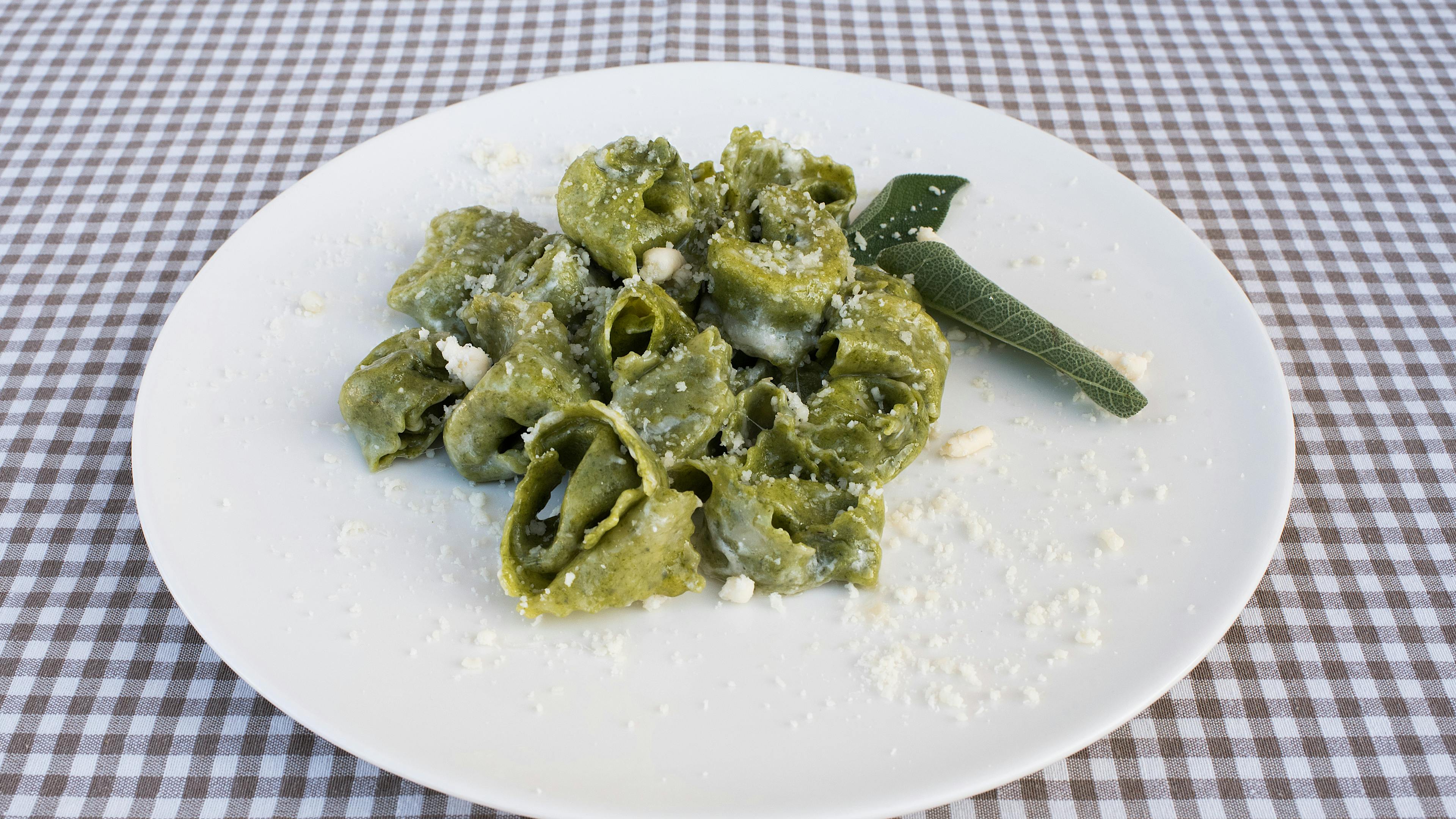 Plate of Balanzoni with Grana cheese