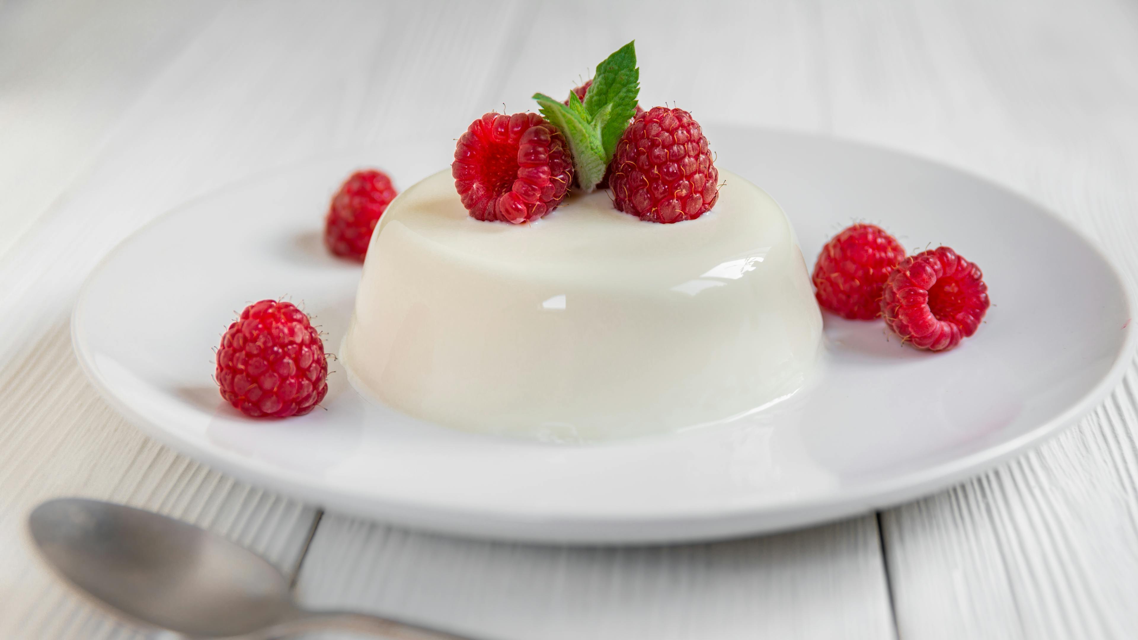 portuguese milk pudding with raspberries
