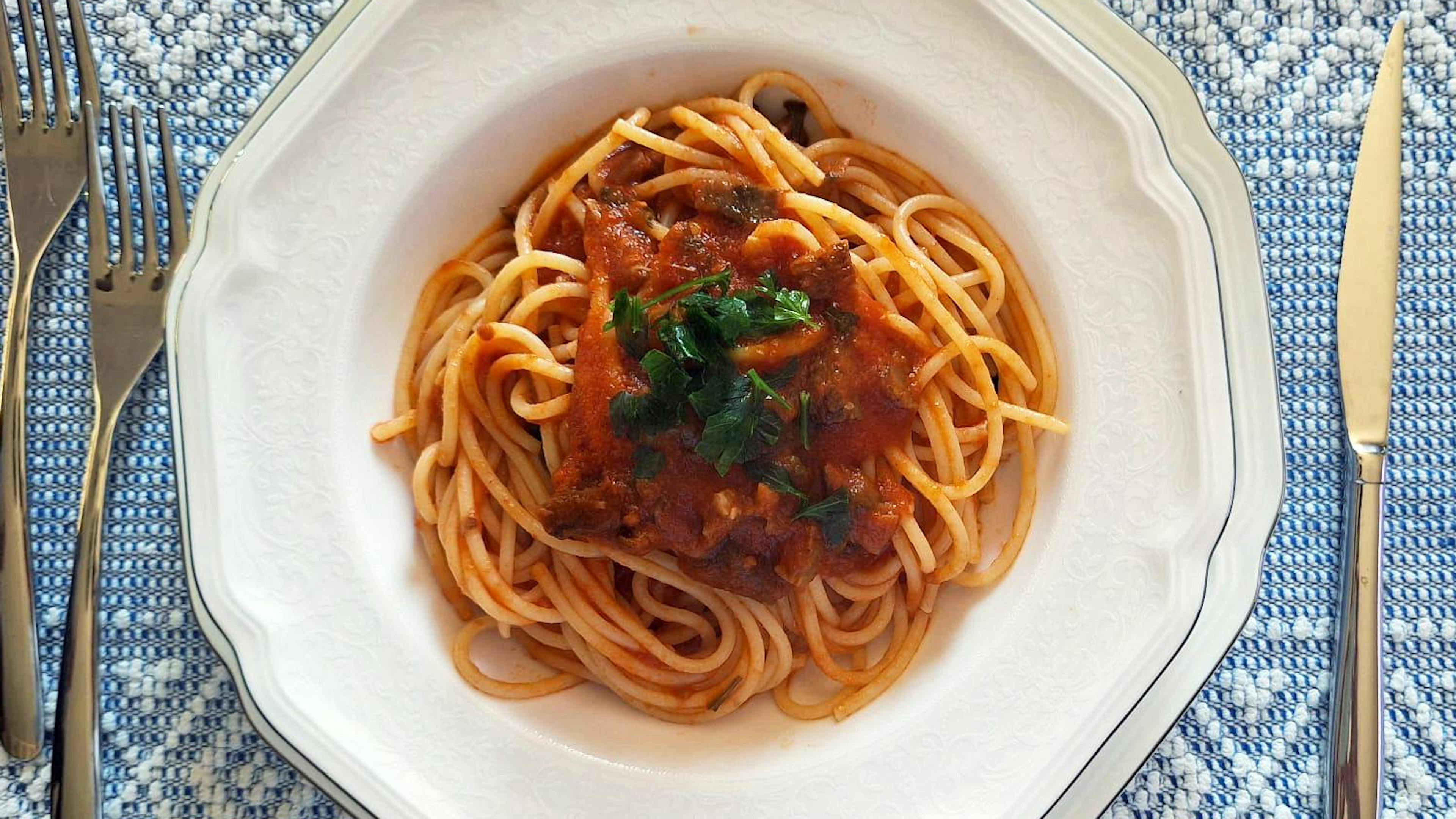 Spaghetti with red pine mushroom sauce