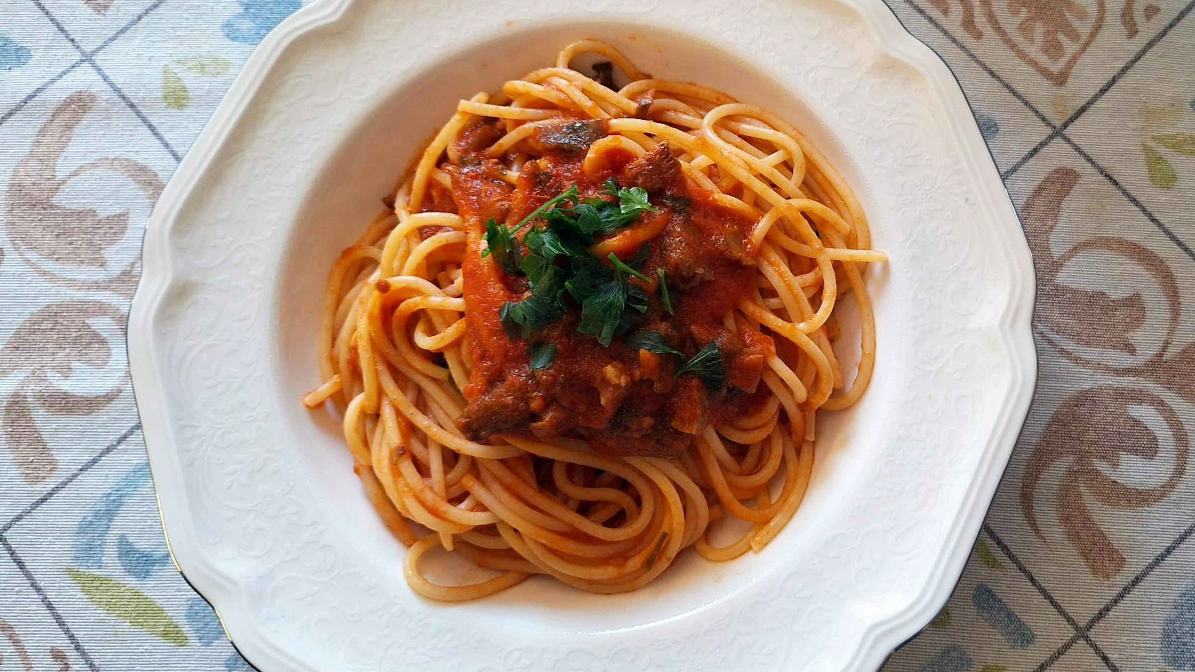 Spaghetti with red pine mushroom sauce