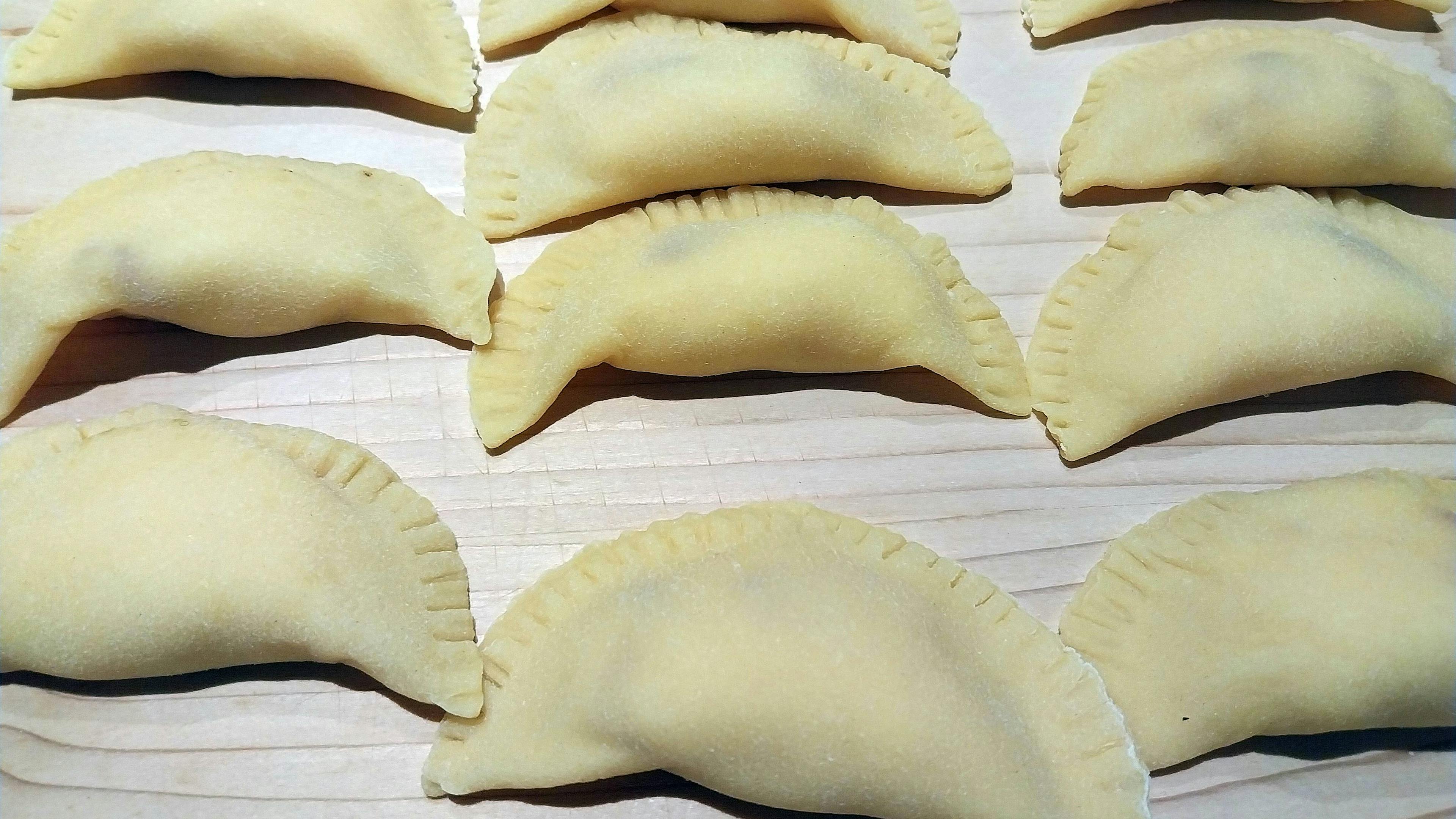 Uncooked Ciociarian Calascioni (traditional baked savory pastries)