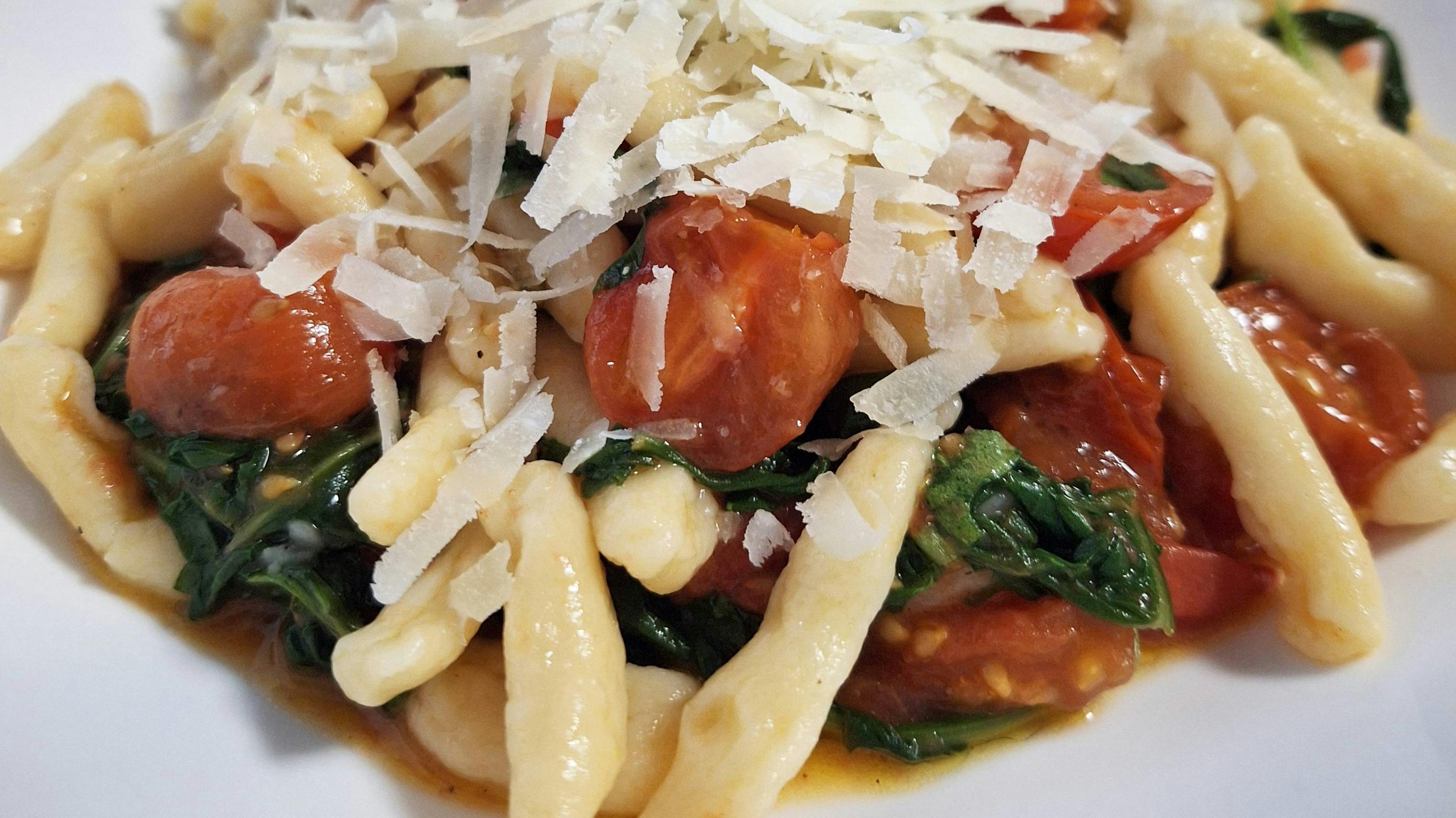 Capunti Pasta with Arugula and Sweet Cherry Tomatoes