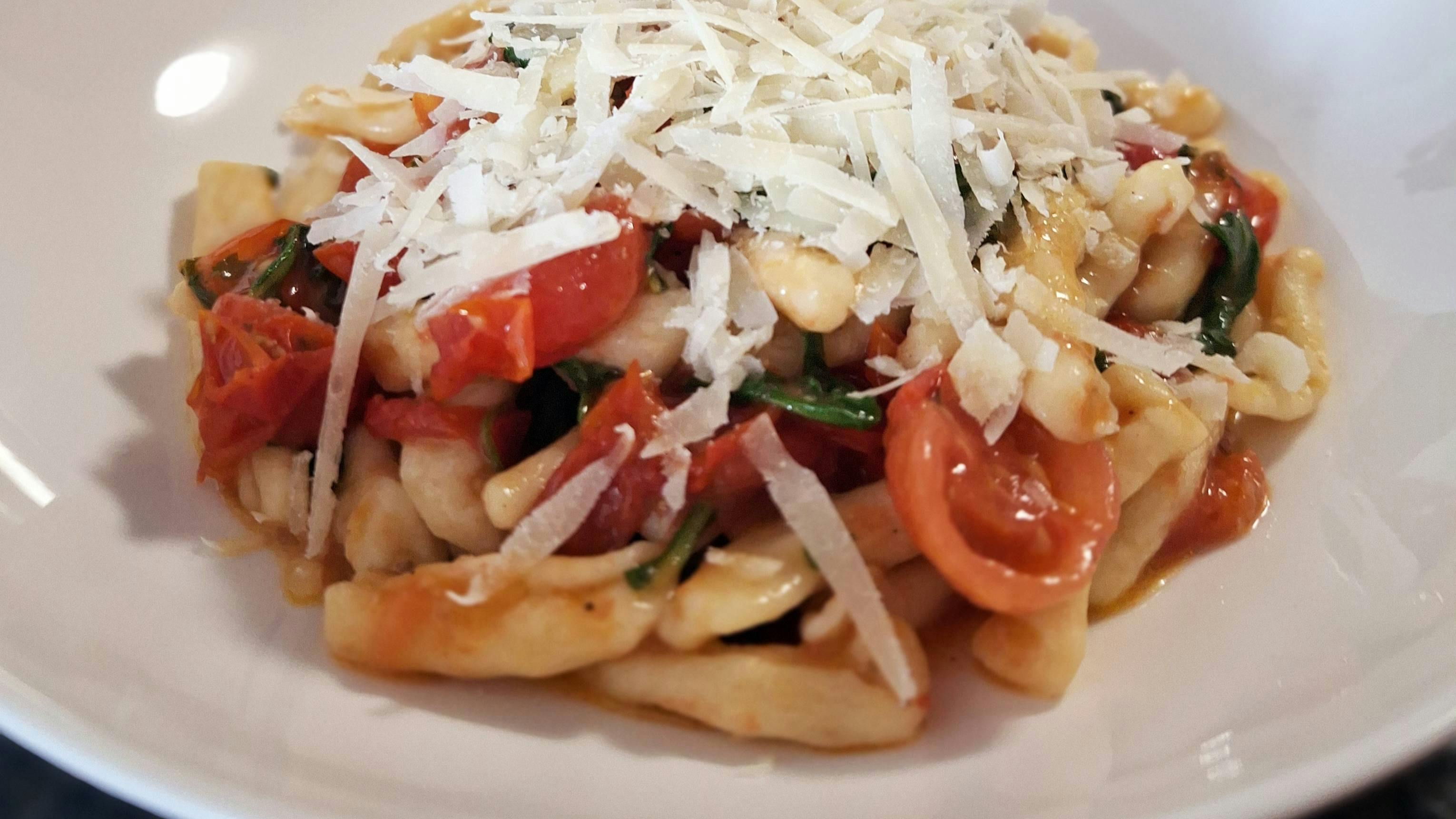 Capunti Pasta with Arugula and Sweet Cherry Tomatoes