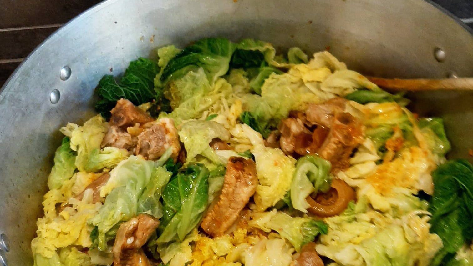 Italian pork and cabbage stew (Cassoeula) served in a pan