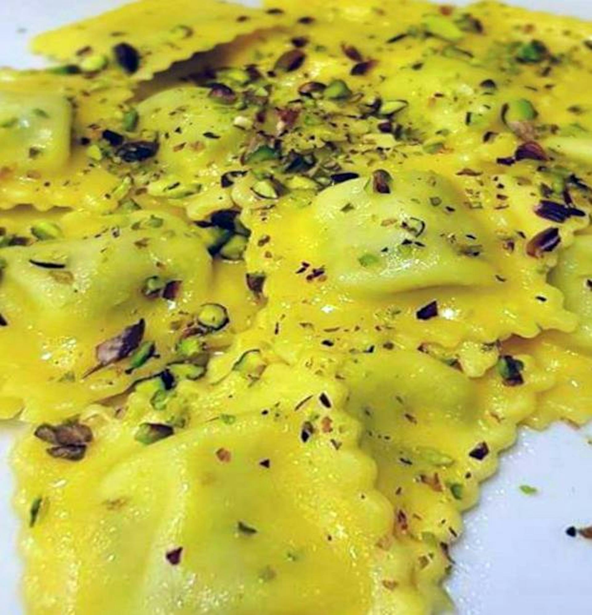 Tortelli di zucca e pancetta con granella di pistacchio