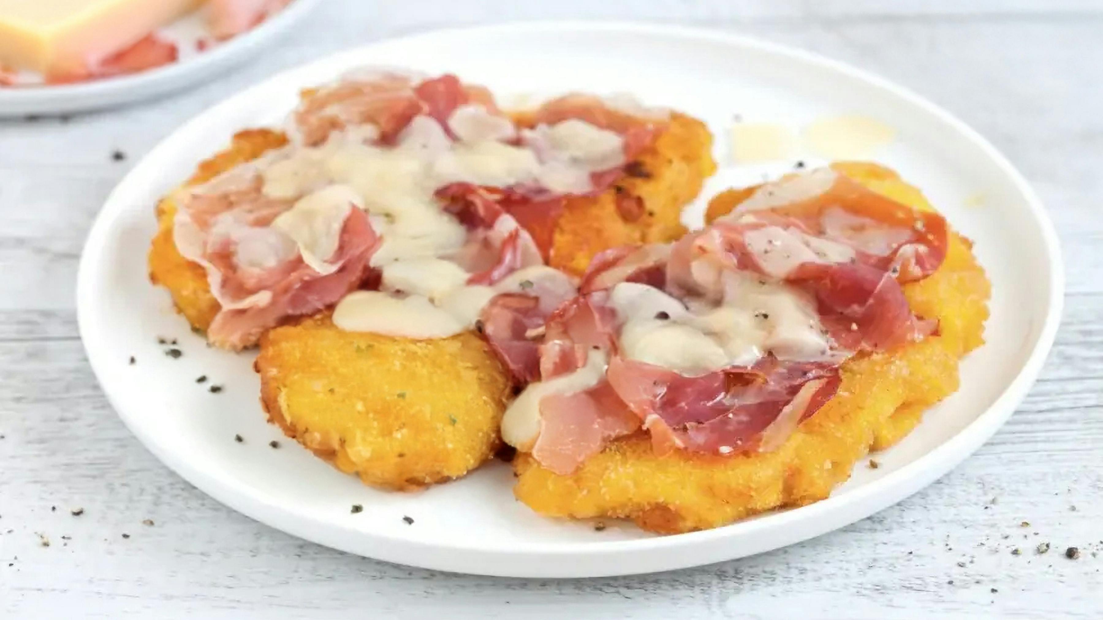 Cotoletta bolognese su piatto