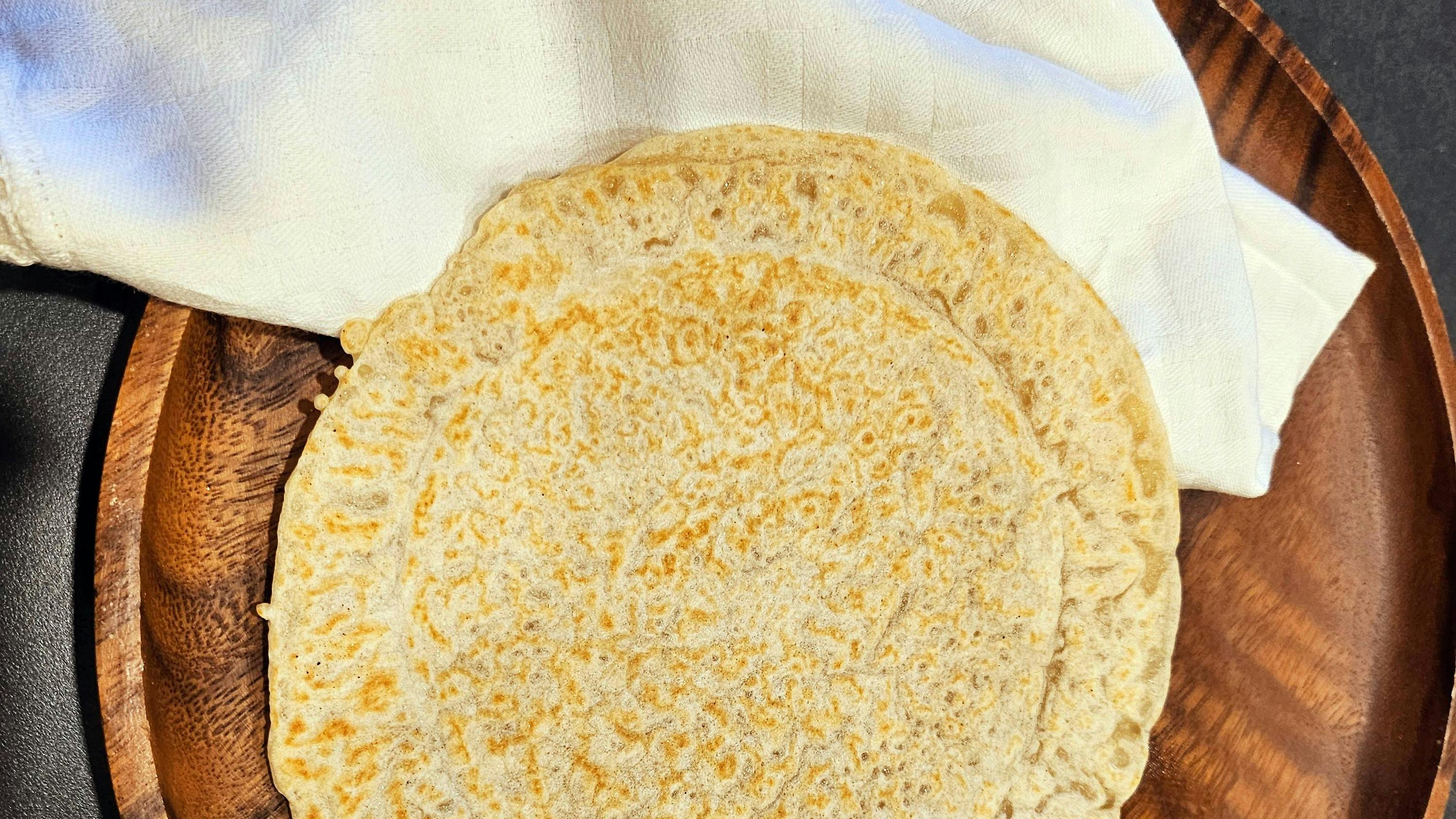 Ciacci Montanari on a wooden cutting board, Modenese culinary traditions