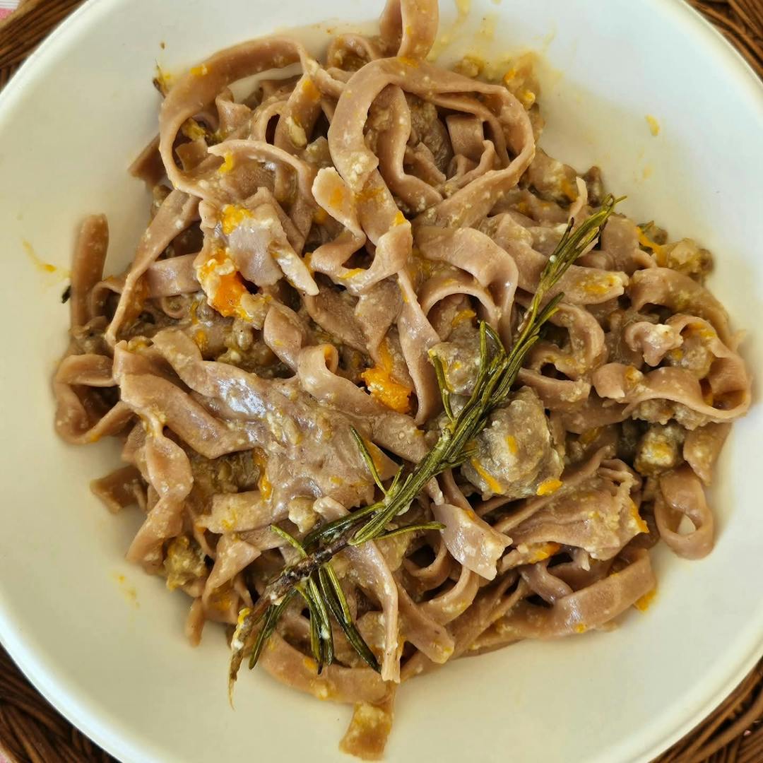 Chestnut Flour Tagliatelle with Sausage, Pumpkin, and Taleggio Fondue