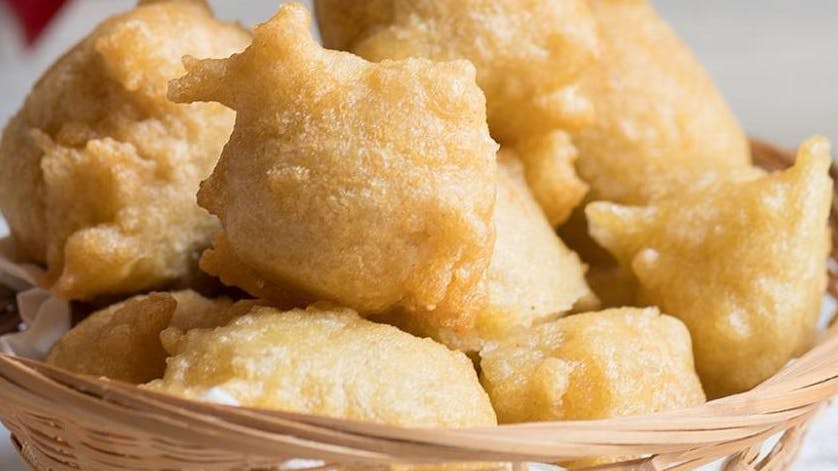 Pettole, also known as pittule, a traditional Apulian treat enjoyed at Christmas or on St. Martin’s Day