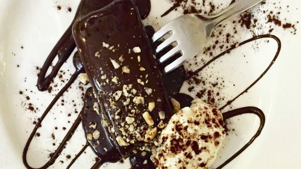 Almond parfait with warm chocolate sauce, Sicilian pastry, traditional Sicilian desserts