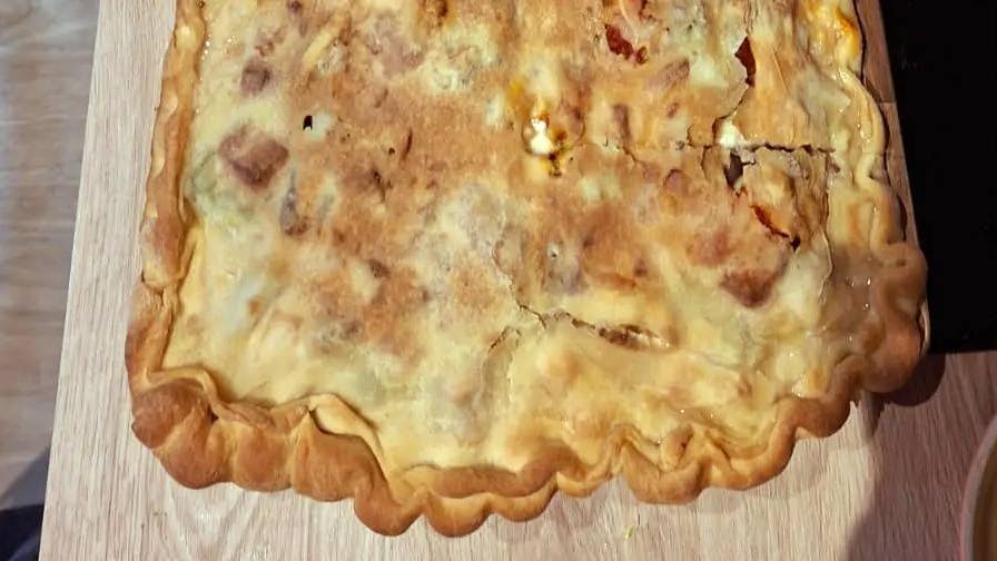 Catanese Scacciata: the savory pie typical of Eastern Sicily, a flaky crust enclosing a rich and flavorful filling