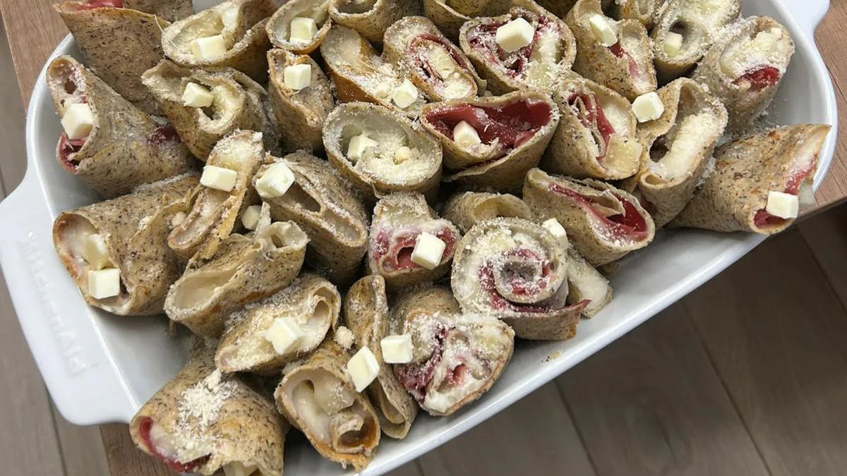 Valtellina manfrigole: rustic crepes filled with Casera cheese and bresaola, a traditional one-dish meal from the Upper Valtellina
