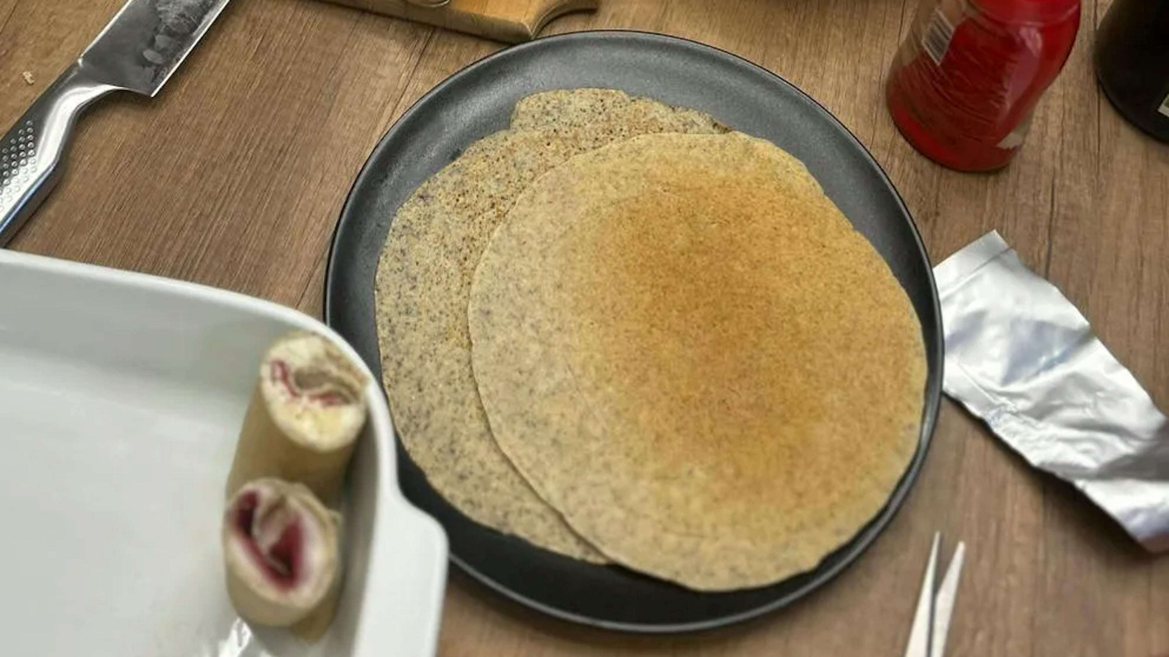 Valtellina manfrigole: rustic crepes filled with Casera cheese and bresaola, a traditional one-dish meal from the Upper Valtellina