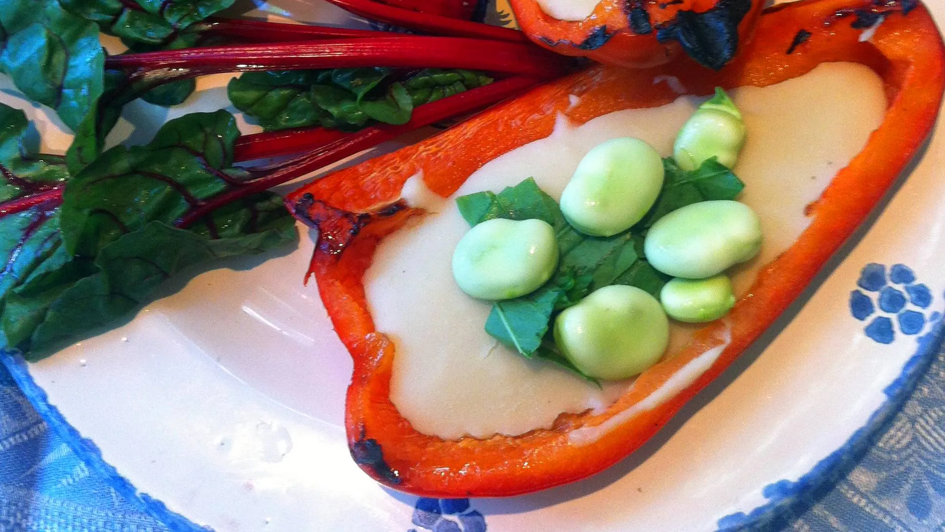 Broad beans and baby broad beans in a pepper nest, a spring recipe from Puglia