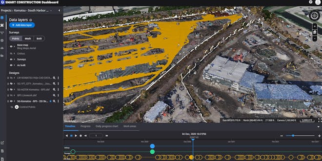 Smart Construction user interface showing construction site change over time on a timeline