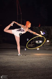 Hannah dances with a flaming hula hoop