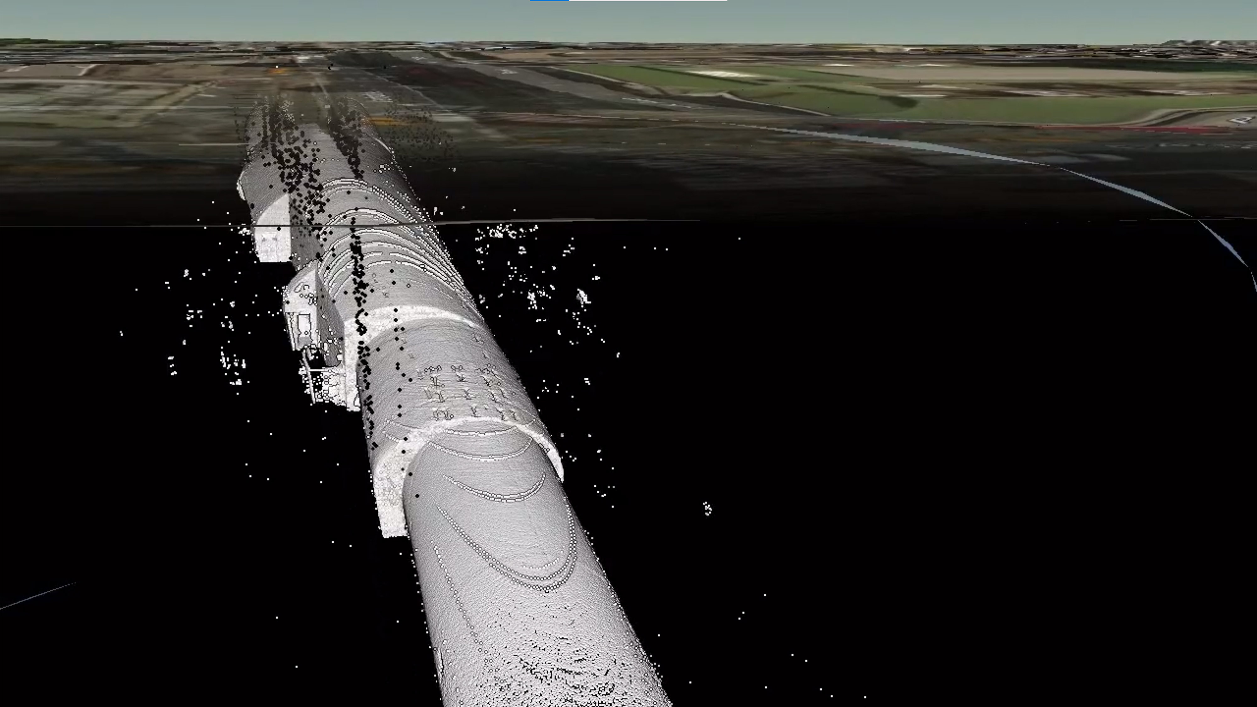 A tunnel that appears as a white tube that is underground  