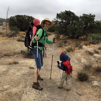 Sarah Chow hiking with two children.