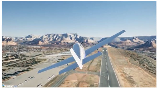 Fixed-wing aircraft flies above an airport, with mountains in the distance.