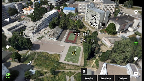 3D model of city in Ukraine in Farsight app. Its Vertical Measurement Tool measures length, height, and diagonal from a point on a soccer field.