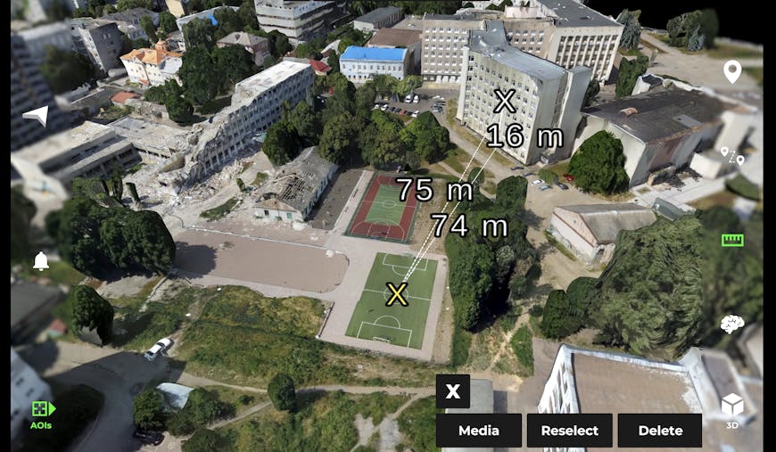 3D model of city in Ukraine in Farsight app. Its Vertical Measurement Tool measures length, height, and diagonal from a point on a soccer field.