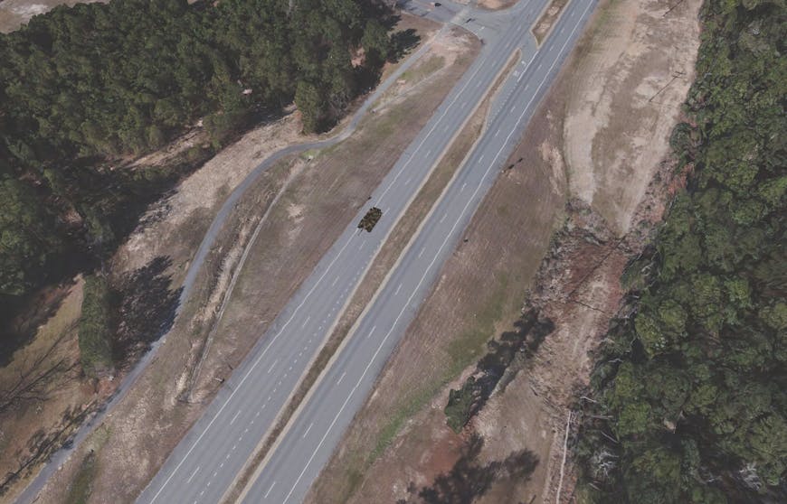 Rendering of Fort Polk Louisiana Training Facility seen through Army Game Studio IG while controlled by  MUSE/AFSERS software made by Joint Simulation Integration Laboratory [JSIL]