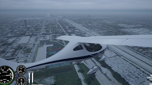 A Flight Design CTLS two-seater ultralight airplane flies over an airport in the fog.