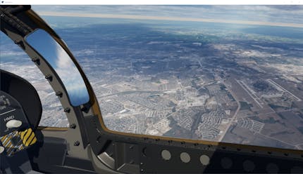 XR flight simulator over Randolph AFB, Texas, using Cesium for Unreal and Cesium ion. The student sees Randolph AFB out the window of the aircraft, with landing strips, roads, fields, buildings, and the sky visible.