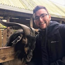 Alex Gallegos with a goat