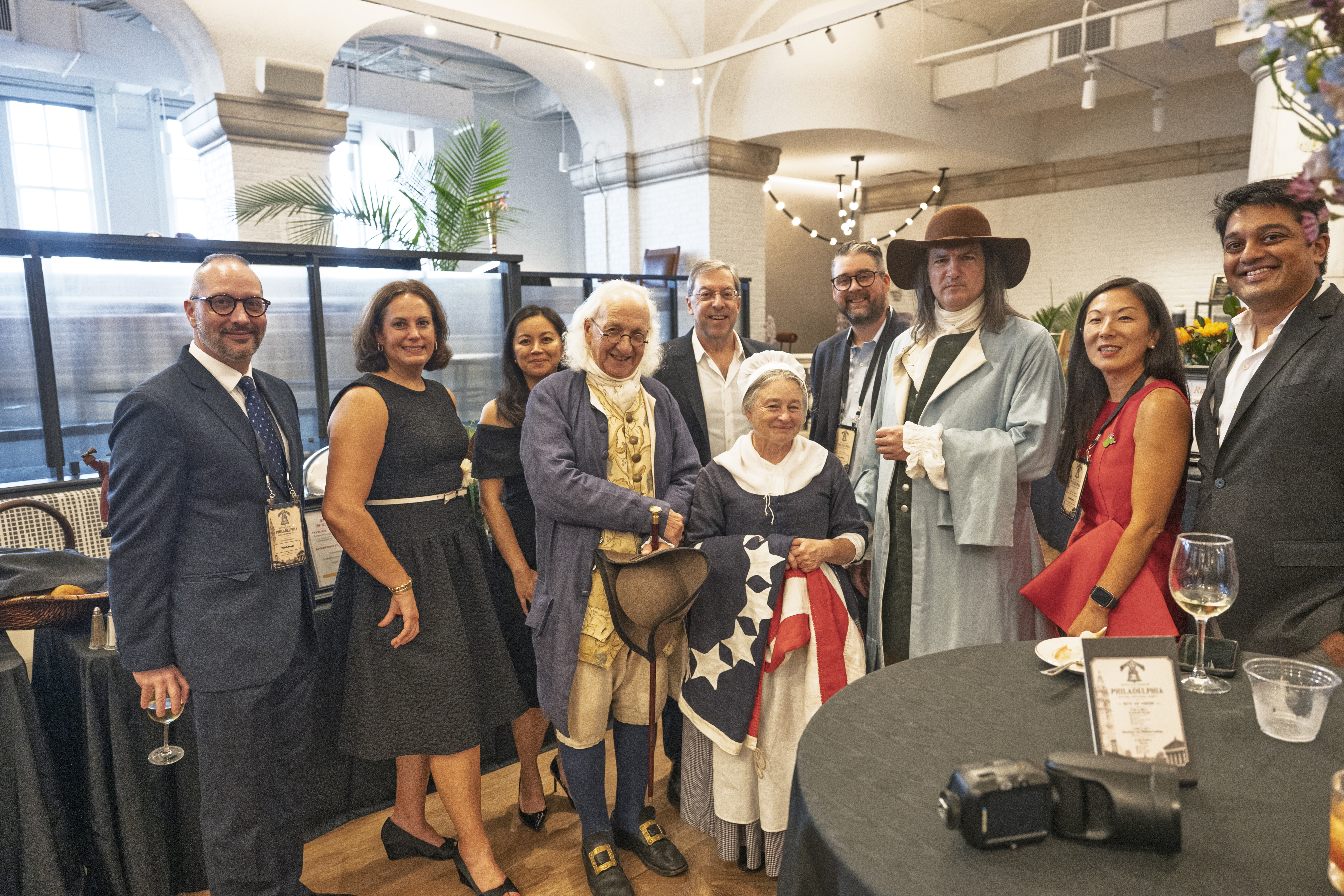 historical reenactors and Bentley team gathers in the office