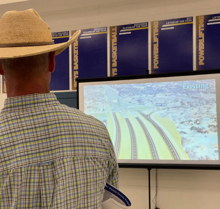 Attendee viewing the US 281 public engagement visualization during the TxDOT public meeting