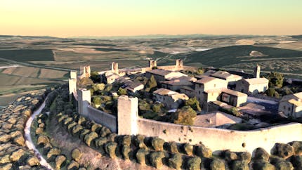 Sketchfab model of walled town Monteriggioni, Italy, imported via Cesium ion, placed on Cesium World Terrain with Bing Imagery, and visualized with Cesium for Omniverse. Sketchfab model: Monteriggioni: HIGH quality by omnidirectional with CC Attribution.
