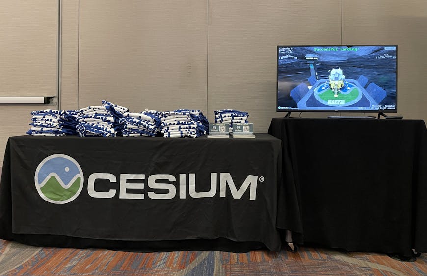 SIGGRAPH 2024: Cesium T-shirts and the lunar lander game at the Khronos Networking Reception.