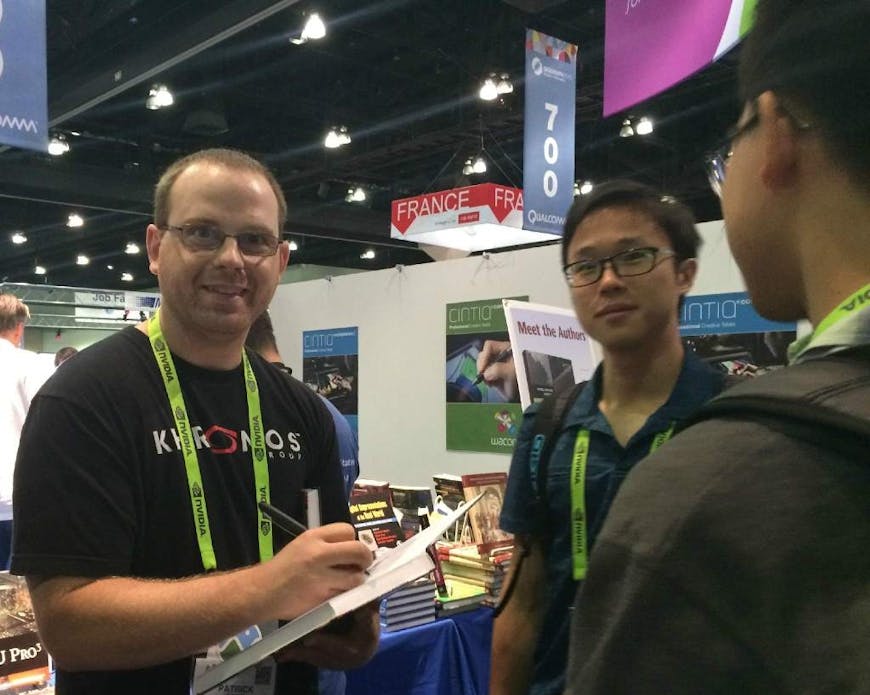 Patrick Cozzi signs books at SIGGRAPH 2015