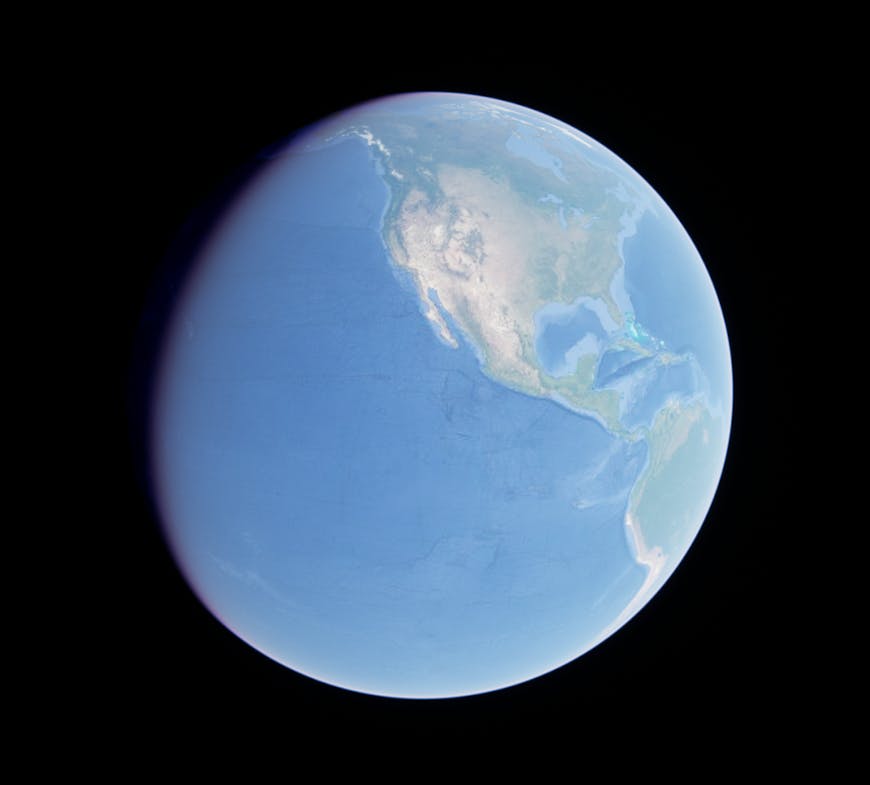 Google Photorealistic 3D Tiles captured from an outer space view, after improvements to its generated normals and surrounding atmosphere.